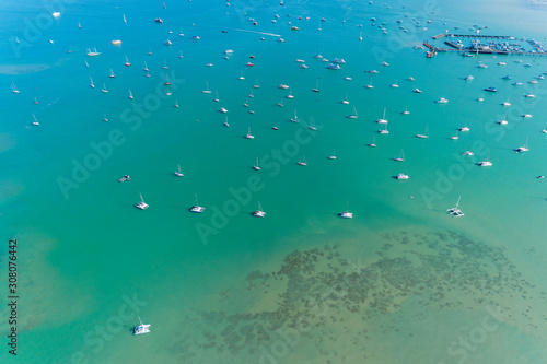 Aerial view drone shot of sailing boats in tropical sea.
