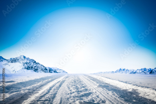Winter background of road and free space for your decoration. © magdal3na
