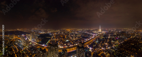 Aerial Panorama of Ho Chi Minh City, Vietnam at night from Thao Dien in District two. Thao Dien is one area with many expats