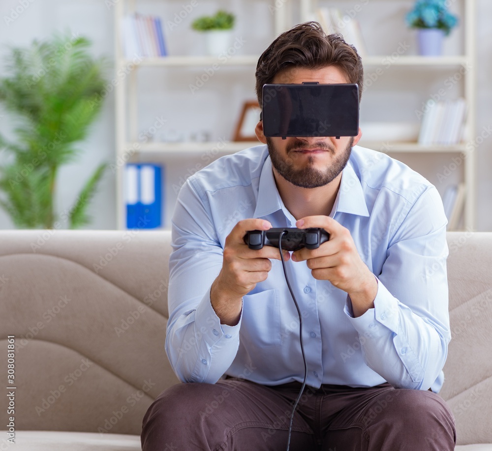 Student gamer playing games at home Student gamer playing games at home