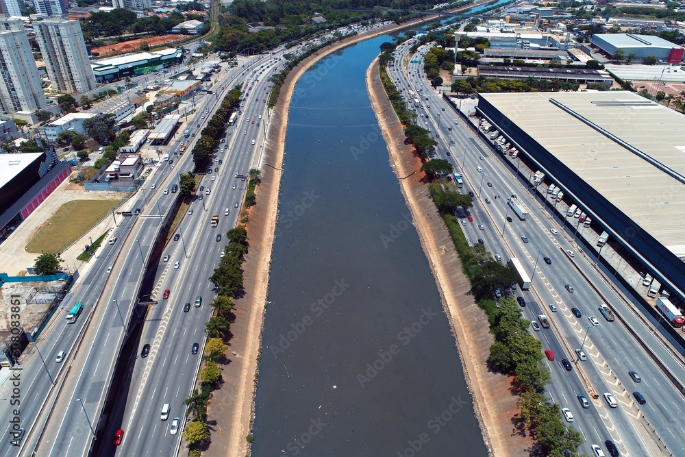 Aerial view of river between roads. Cityscape scenery. Great landscape. Marginal Tietê, São Paulo, Brazil Aerial view of river between roads. Cityscape scenery. Great landscape. Marginal Tietê, São Paulo, Brazil
