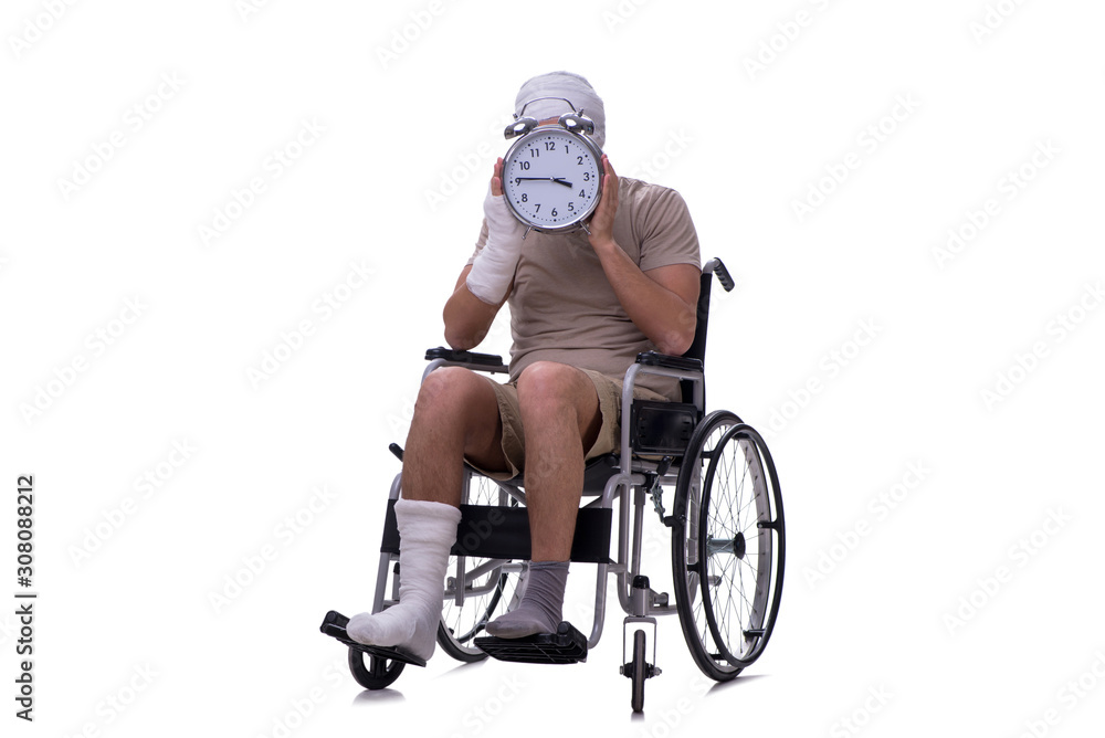 Injured man in wheel-chair isolated on white Injured man in wheel-chair isolated on white