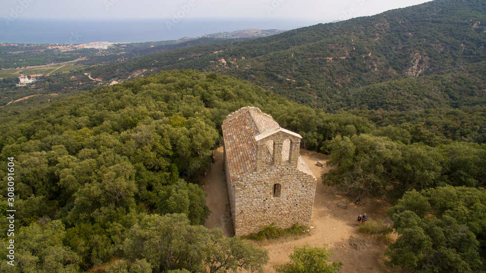Aerial view of the St Laurent chapel with the Mediterranean sea in the background