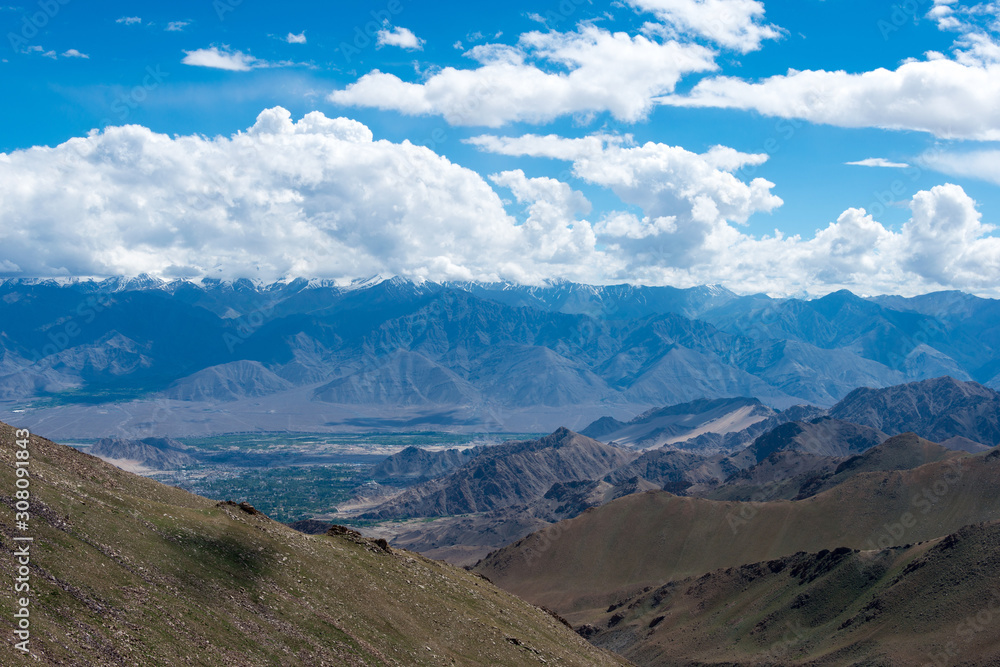 Ladakh, India - Aug 03 2019 - Beautiful scenic view from Between Khardung La Pass (5359m) and Leh in Ladakh, Jammu and Kashmir, India.