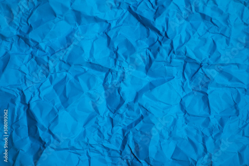 Blue paper crease texture background.