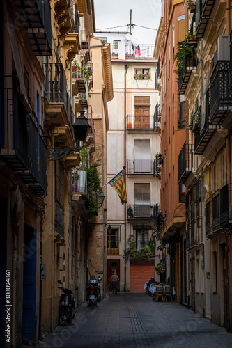 Typical street of Valencia old town, Spain