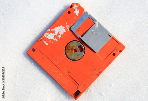 abandoned broken floppy disk display in white background view