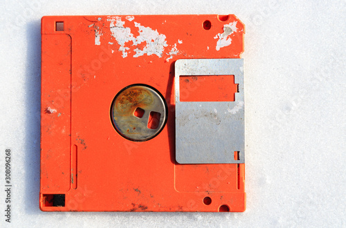 abandoned broken floppy disk display in white background view