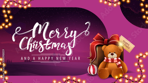 Merry Christmas and happy New Year, purple modern postcard with tinted winter landscape, garland, beautiful lettering and present with Teddy bear