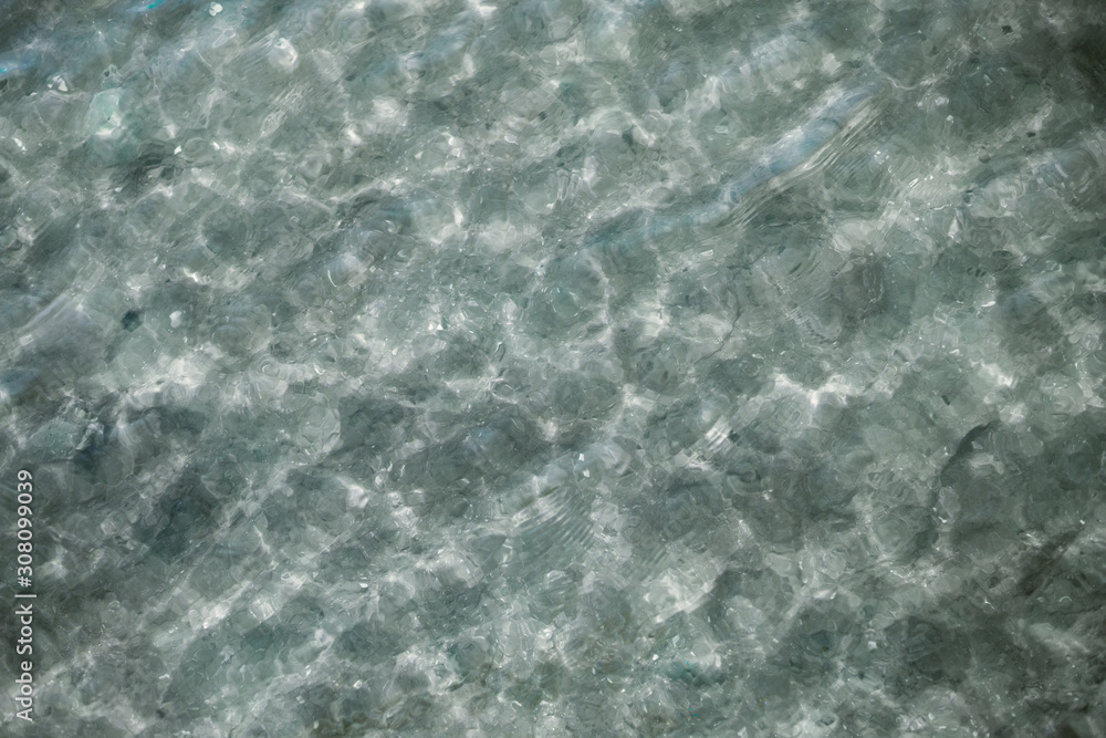 Crystal clear water reflecting the sun's light Crystal clear water reflecting the sun's light