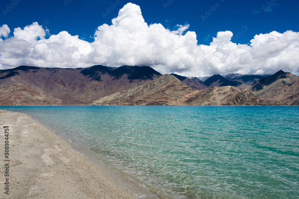 Obraz premium Ladakh, India - Aug 06 2019 - Pangong Lake view from Between Kakstet and Merak in Ladakh, Jammu and Kashmir, India. The Lake is an endorheic lake in the Himalayas situated at a height of about 4350m.
