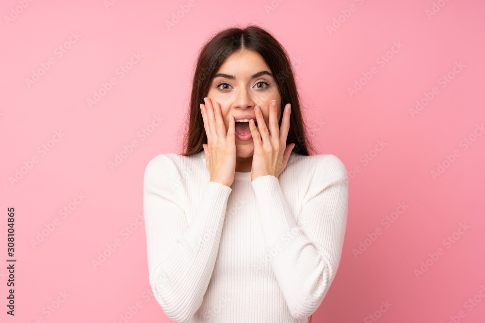 Young woman over isolated pink background with surprise facial expression Young woman over isolated pink background with surprise facial expression