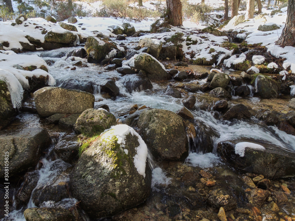 The Navacerrada River in the La Barranca Valley in the Sierra de Guadarrama National Park. Madrid's community. Spain The Navacerrada River in the La Barranca Valley in the Sierra de Guadarrama National Park. Madrid's community. Spain