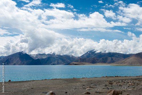 Ladakh, India -Aug 06 2019 - Pangong Lake view from Between Kakstet and Chushul in Ladakh, Jammu and Kashmir, India. The Lake is an endorheic lake in the Himalayas situated at a height of about 4350m. photo