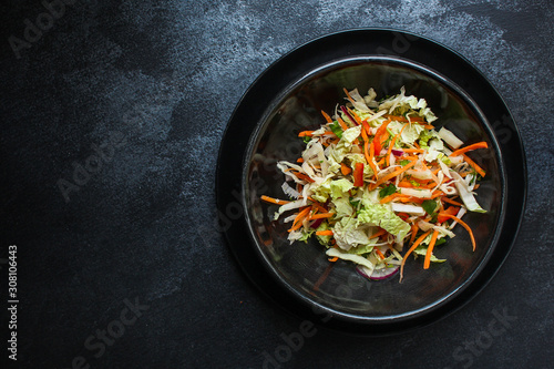 healthy vegetable salad (Chinese cabbage, carrot, onion, lettuce, mix salad, pumpkin) menu concept. food background. top view. copy space