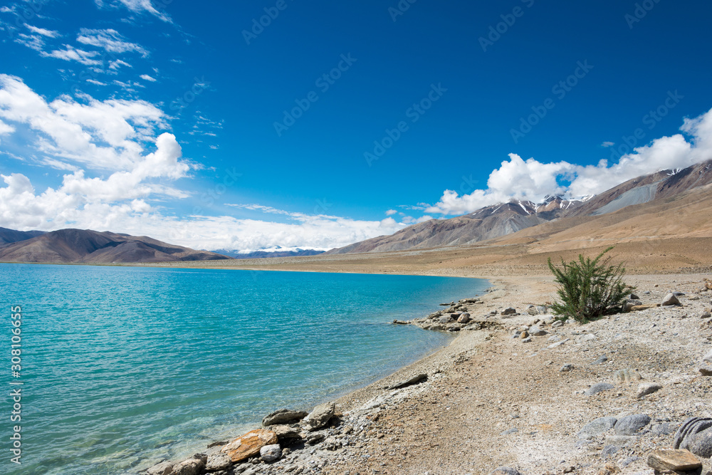 Obraz premium Ladakh, India -Aug 06 2019 - Pangong Lake view from Between Kakstet and Chushul in Ladakh, Jammu and Kashmir, India. The Lake is an endorheic lake in the Himalayas situated at a height of about 4350m.