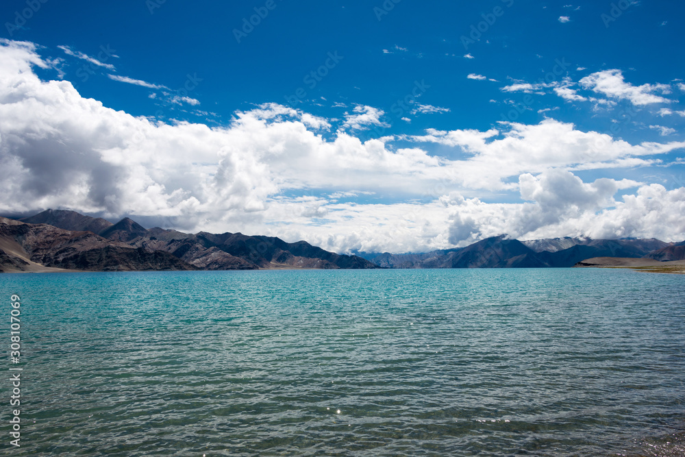 Ladakh, India -Aug 06 2019 - Pangong Lake view from Between Kakstet and Chushul in Ladakh, Jammu and Kashmir, India. The Lake is an endorheic lake in the Himalayas situated at a height of about 4350m.