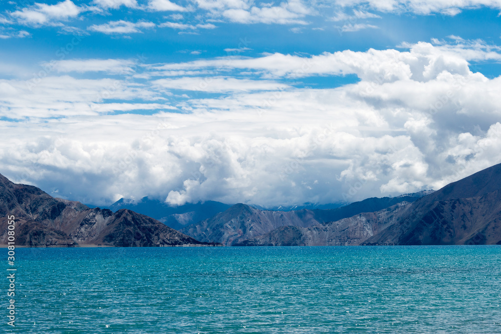 Ladakh, India -Aug 06 2019 - Pangong Lake view from Between Kakstet and Chushul in Ladakh, Jammu and Kashmir, India. The Lake is an endorheic lake in the Himalayas situated at a height of about 4350m. Ladakh, India -Aug 06 2019 - Pangong Lake view from Between Kakstet and Chushul in Ladakh, Jammu and Kashmir, India. The Lake is an endorheic lake in the Himalayas situated at a height of about 4350m.
