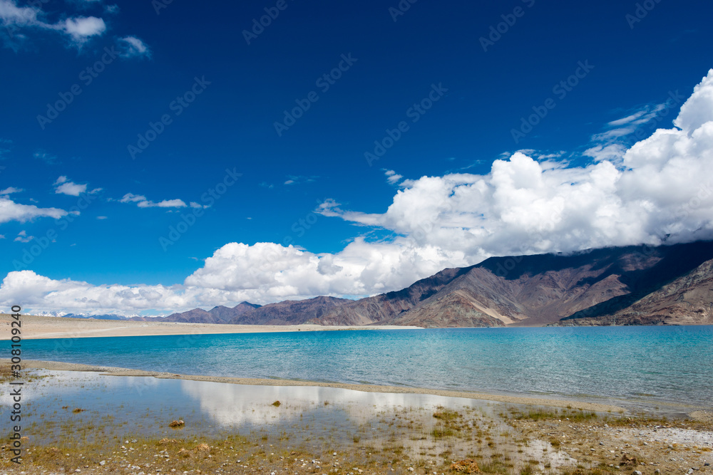 Ladakh, India -Aug 06 2019 - Pangong Lake view from Between Kakstet and Chushul in Ladakh, Jammu and Kashmir, India. The Lake is an endorheic lake in the Himalayas situated at a height of about 4350m. Ladakh, India -Aug 06 2019 - Pangong Lake view from Between Kakstet and Chushul in Ladakh, Jammu and Kashmir, India. The Lake is an endorheic lake in the Himalayas situated at a height of about 4350m.