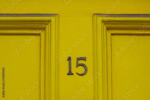 Yellow house number 15