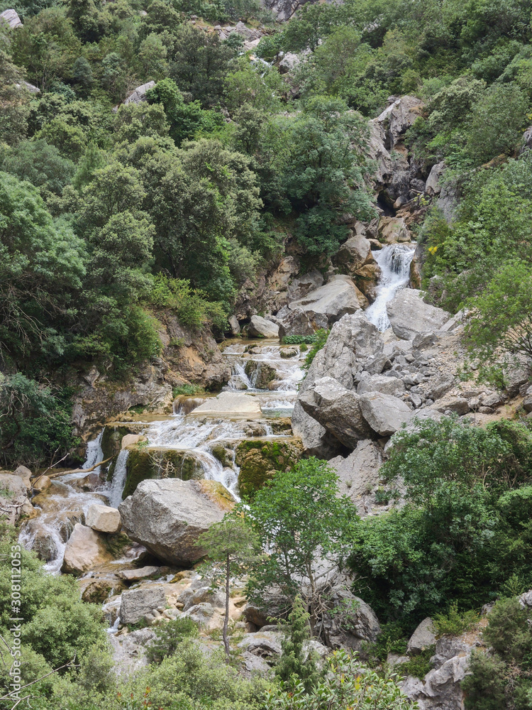 Cascades of the Guadalquivir River as it passes through Cerrada de Utrero in the Natural Park of the Sierra de Cazorla, Segura and Las Villas. In Jaén, Andalusia. Spain Cascades of the Guadalquivir River as it passes through Cerrada de Utrero in the Natural Park of the Sierra de Cazorla, Segura and Las Villas. In Jaén, Andalusia. Spain