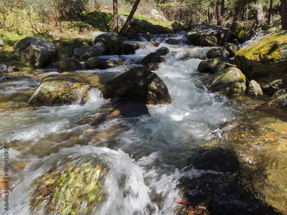 Fototapeta premium The Navacerrada River in the La Barranca Valley in the Sierra de Guadarrama National Park. Madrid's community. Spain