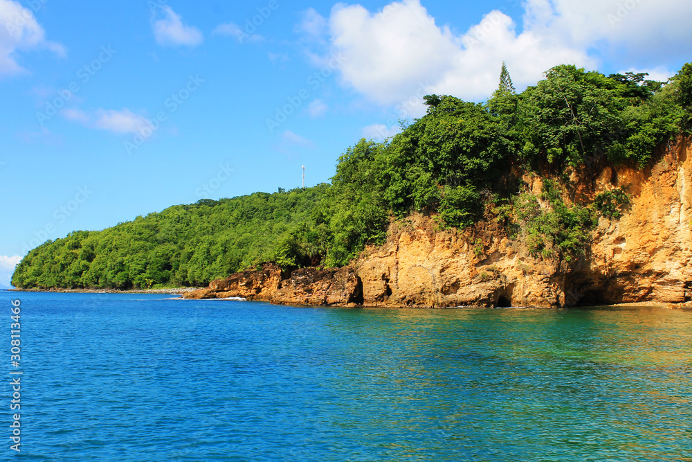 Caves in the cliffs along the shoreline, St. Lucia, West Indies