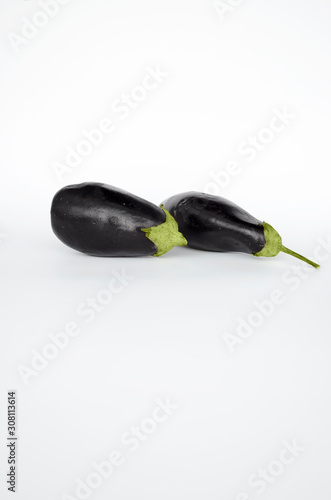 Eggplants isolated on the white background. Aubergine close-up. Selective focus
