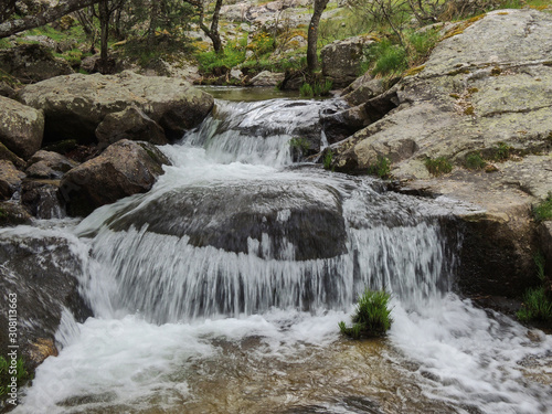 The Sunday Falls of the Aguil  n or Navahondilla stream. Road to the Purgatorio waterfall in the Sierra de Guadarrama. Lozoya Valley Madrid s community.