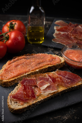 toast with ham oil and tomato