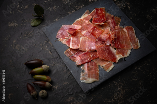 Acorn ham concept. pork product fed with oak acorns, also known in spain as black legged ham