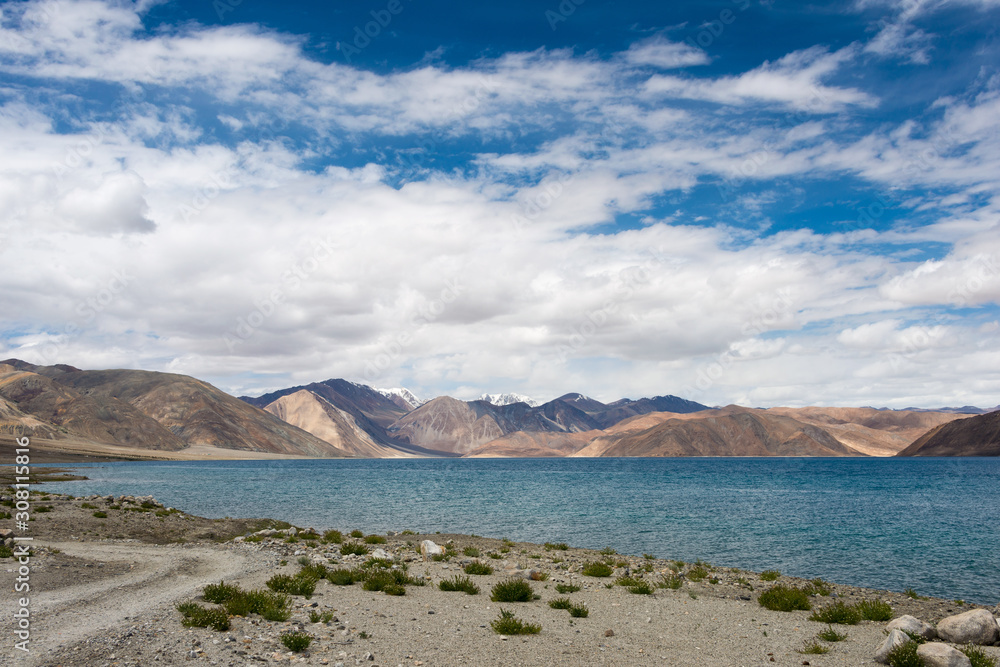 Ladakh, India - Aug 07 2019 - Pangong Lake view from Between Maan and Spangmik in Ladakh, Jammu and Kashmir, India. The Lake is an endorheic lake in the Himalayas situated at a height of about 4350m.