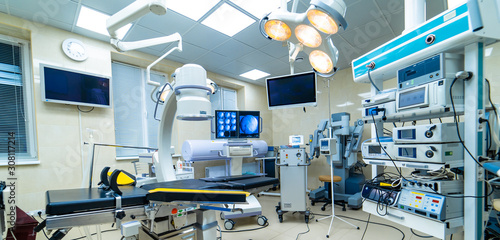 Surgery equipment and instruments in surgery operation room. instruments for microsurgery. Modern operating theatre. © Vadim