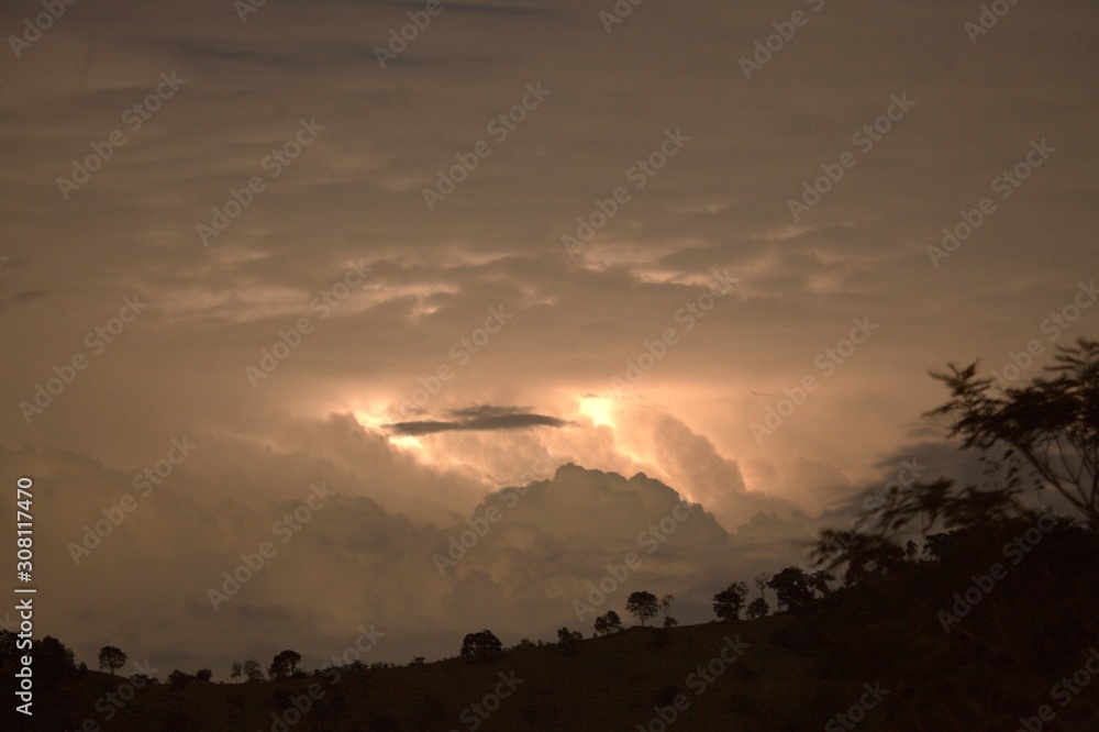Lightning hiding in the clouds. Lightning hiding in the clouds.