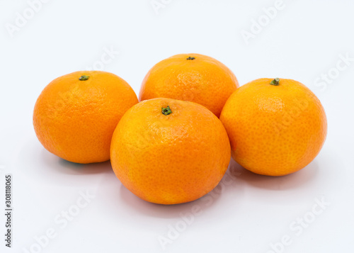 Close up of tangerines isolated on a white background