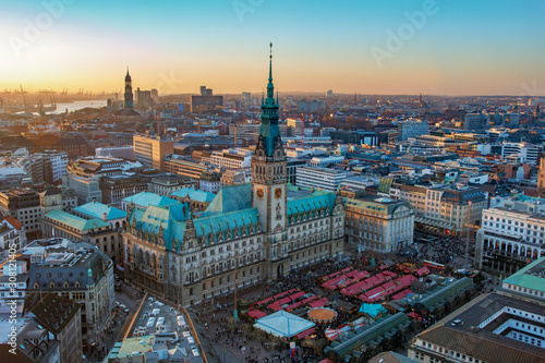 Hamburg at Christmas with the christmas market in the front of the town hall