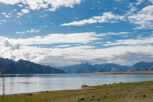 Fototapeta Naklejka Na Ścianę i Meble -  Ladakh, India - Aug 07 2019 - Pangong Lake view from Between Merak and Maan in Ladakh, Jammu and Kashmir, India. The Lake is an endorheic lake in the Himalayas situated at a height of about 4350m.