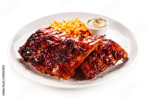 Canvas Print Barbecued ribs and vegetables on white background