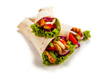 Kebab - grilled meat and vegetables on white background