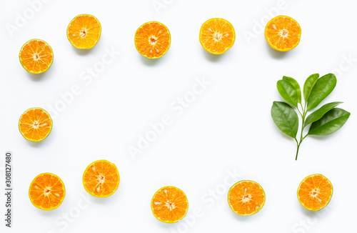 Frame made of fresh orange on white