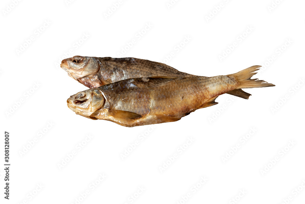 Dried fish isolated on white background. Beer snack. Roach. Selective focus. Space for lettering or design. Dried fish isolated on white background. Beer snack. Roach. Selective focus. Space for lettering or design.