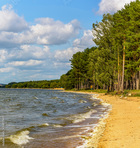 Windy day on the beach at Zaslavsky reservoir. photo