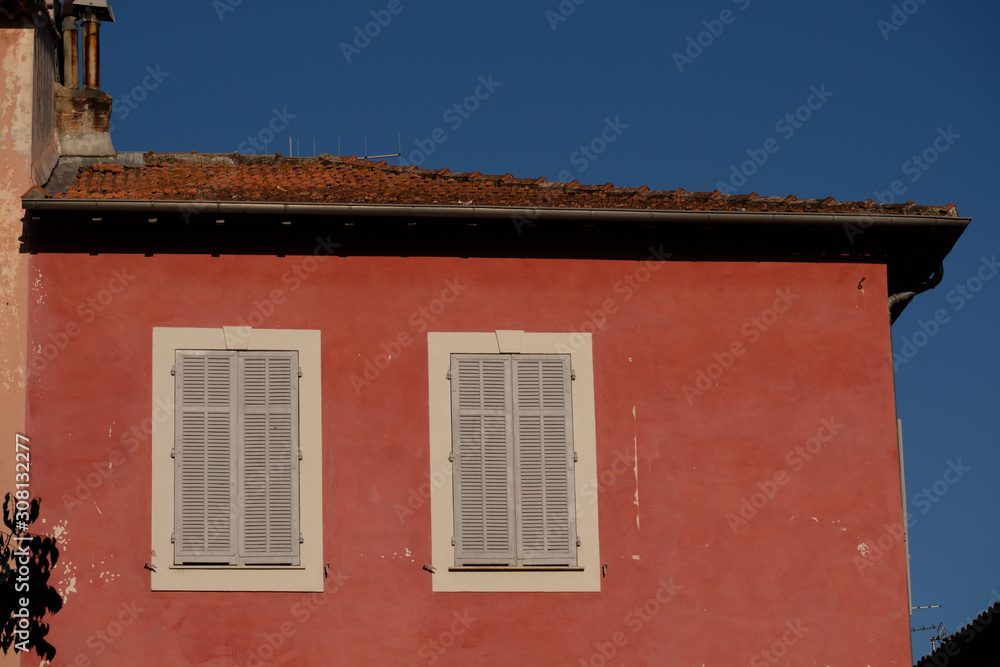 Two windows orange wall south of France