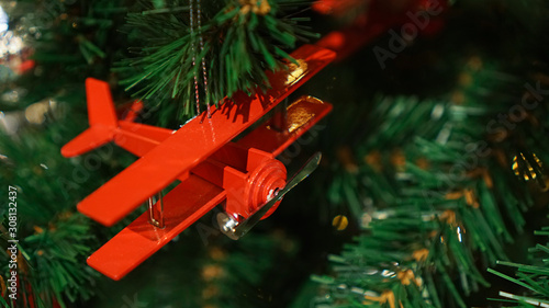 Christmas decorations on the tree. Airplane.