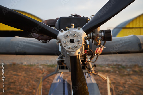 Air propeller of the ultralight aircraft standing on airfield, close-up