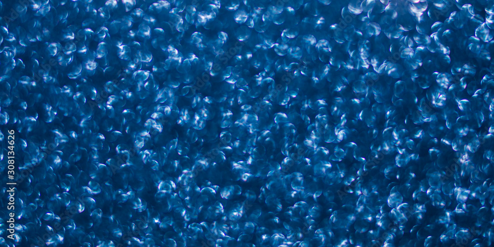 Obraz premium Sparkling classic blue texture background. Color of the year 2020