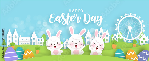 Easter banner with cute rabbits and Easter eggs in paper cut and craft style .