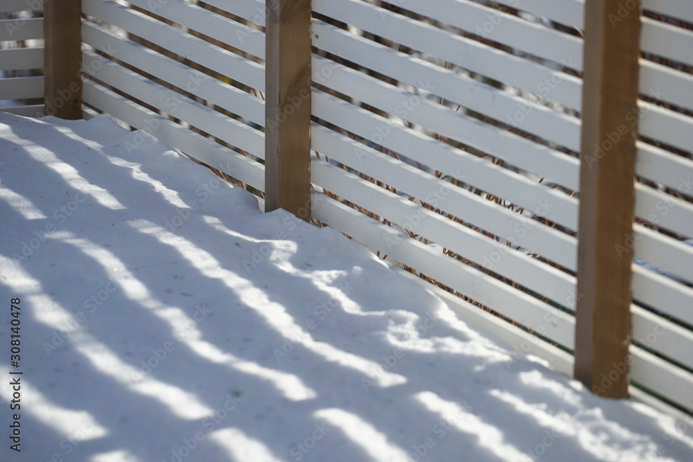 wooden fence in snow, sweden, stockholm, nacka, europe