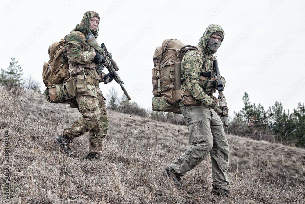 Fototapeta premium Military army soldiers team members patrolling area