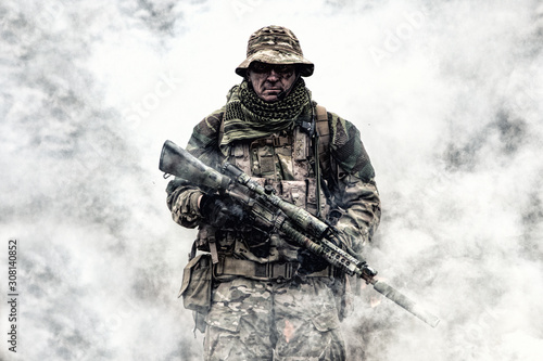 Brutal commando veteran army soldier armed sniper rifle photo